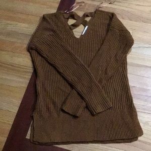 Brown women’s sweater.